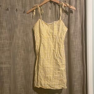 This gingham patterned dress is an absolute must!